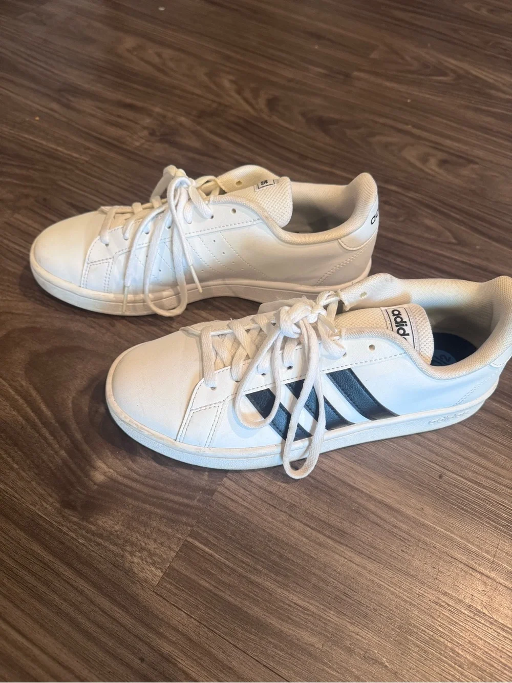 Adidas Women’s White Sneakers with Black Stripes